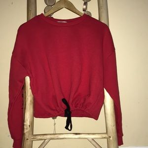 Red long sleeve with print on sleeves